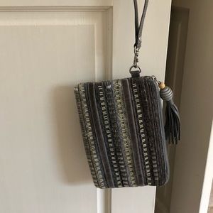 Toms Sightsee stripe wristlet in black bead stripe